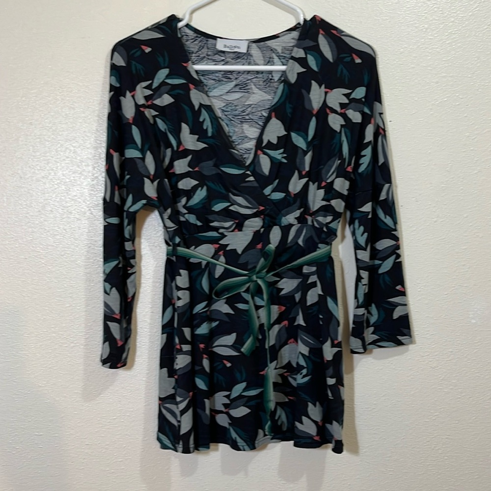Balloon 3/4 sleeved black, gray and aqua floral patterned top. Size Medium
